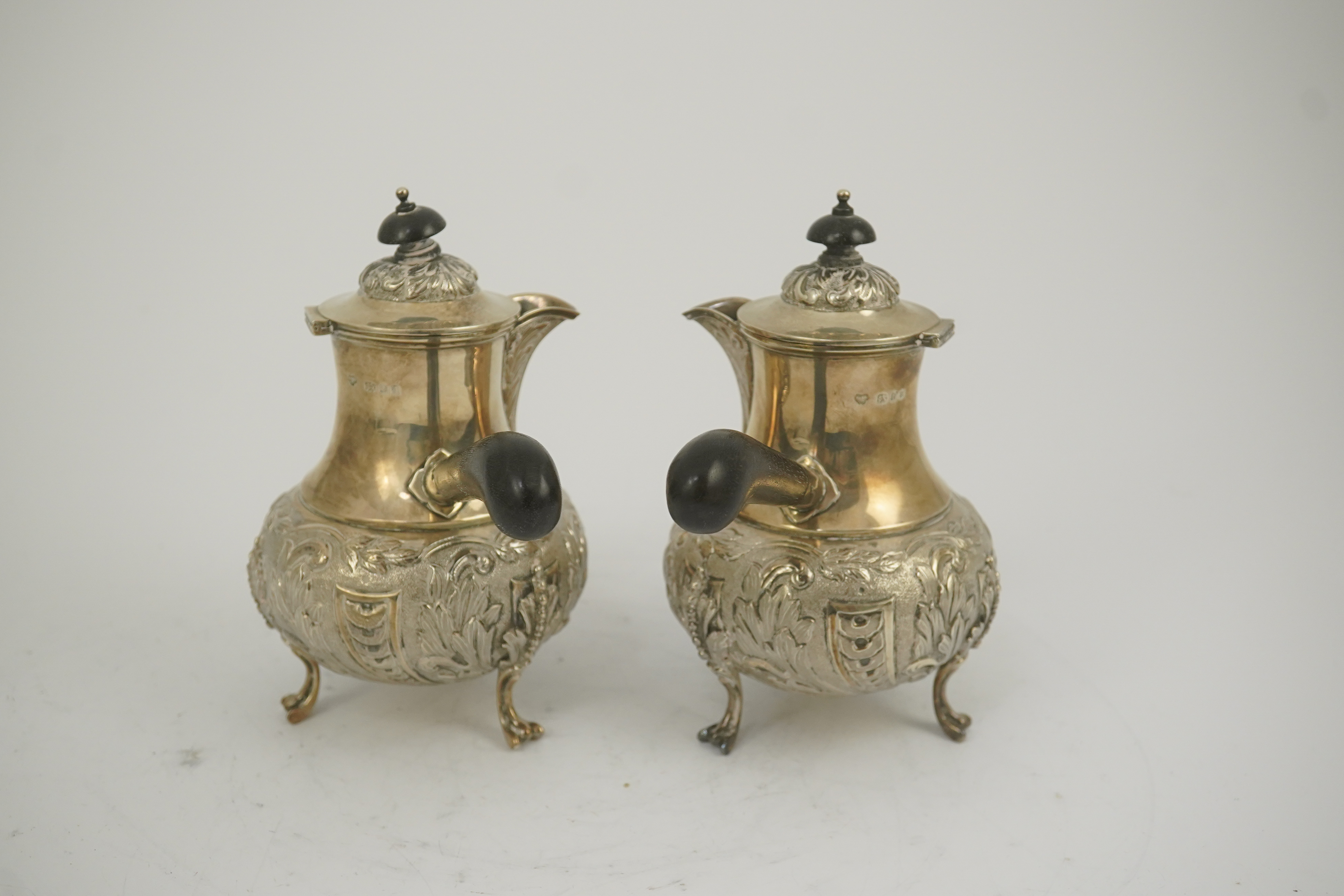 A pair of George V silver chocolate pots, by Goldsmiths & Silversmiths Co Ltd